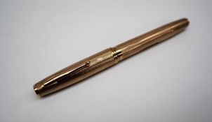 A 9ct yellow gold Waterman's fountain pen with a 14ct gold knib,