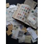 A stamp album of World stamps from Victoria onwards together with loose mint stamps
