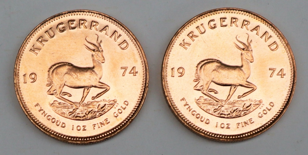 South Africa - Two 1974 Krugerrands, each 1 oz. fine gold (.999). Obv: Bust of Paul Kruger left.