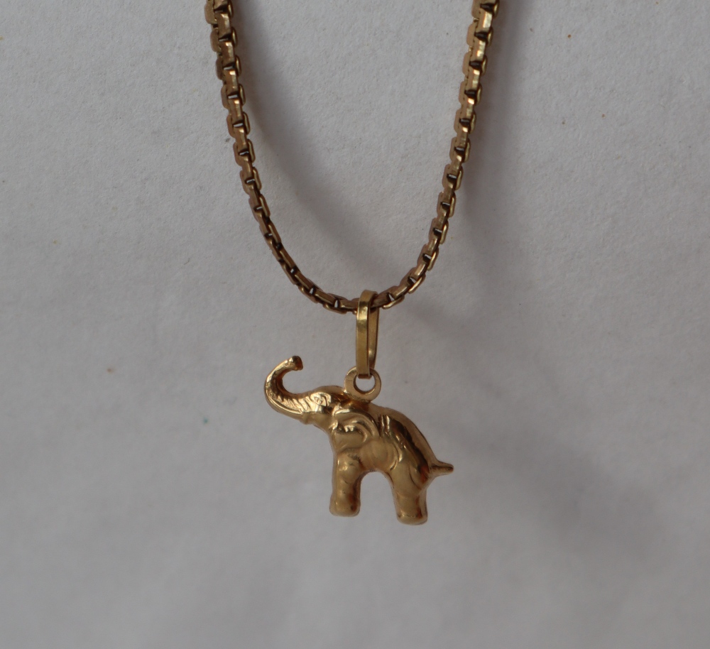 A 9ct yellow gold flat weave necklace, 39cm long together with an elephant pendant approximately 8.