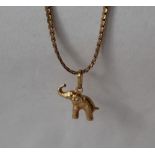 A 9ct yellow gold flat weave necklace, 39cm long together with an elephant pendant approximately 8.