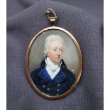 19th century British School Head and shoulders portrait of a gentleman in a blue frock coat An oval