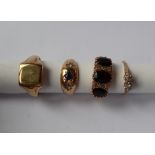 A Gentleman's garnet set 9ct gold ring size L,