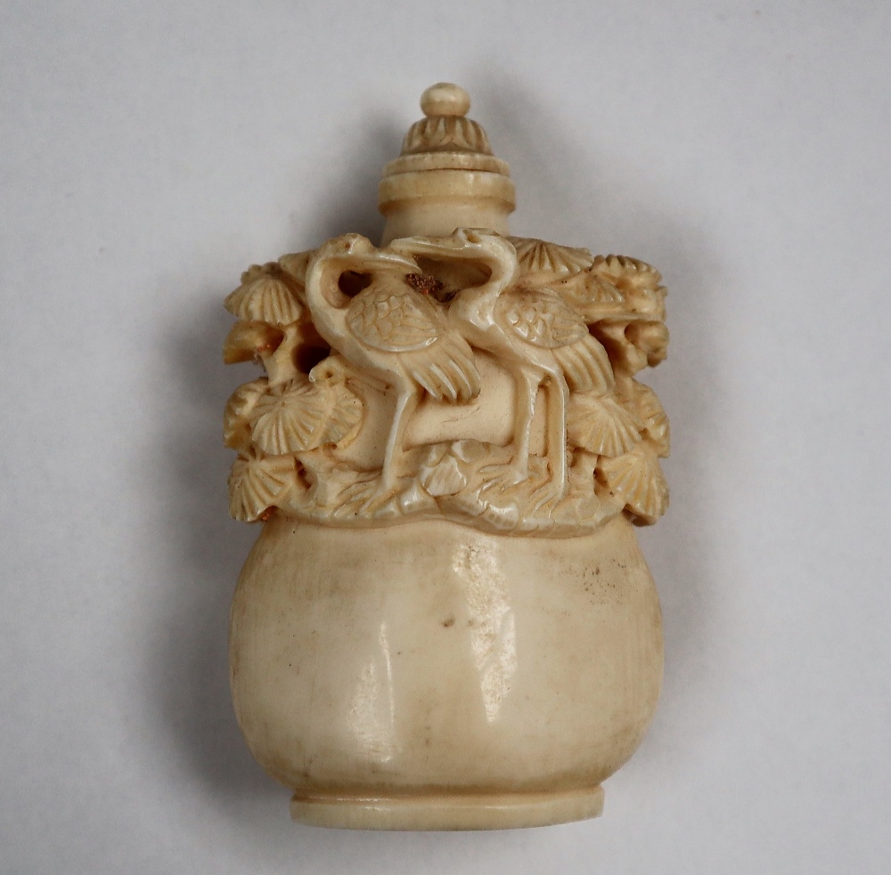A late 19th early 20th century ivory snuff bottle,