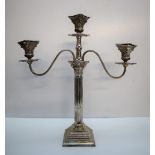 An Elizabeth II silver twin branch candleabra,