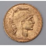 A gold 20 Francs Rooster coin,