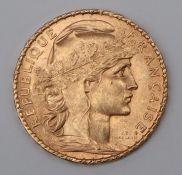 A gold 20 Francs Rooster coin,