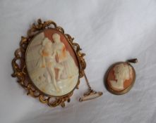 A shell cameo brooch, carved with Romeo and Juliet, to a gilt metal mount, overall 70mm x 60mm,