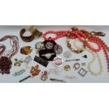 Assorted costume jewellery including beaded necklaces, bangles,