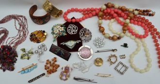 Assorted costume jewellery including beaded necklaces, bangles,
