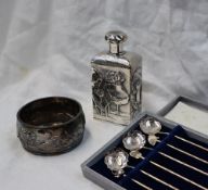A Japanese silver scent bottle of rectangular form, decorated with Lily pads and lilies,