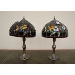 A pair of "Tiffa-Mini" Tiffany style table lamps with domed multicoloured leaded glass shades on