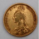 A Victorian gold sovereign dated 1889,