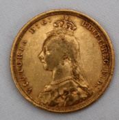 A Victorian gold sovereign dated 1889,