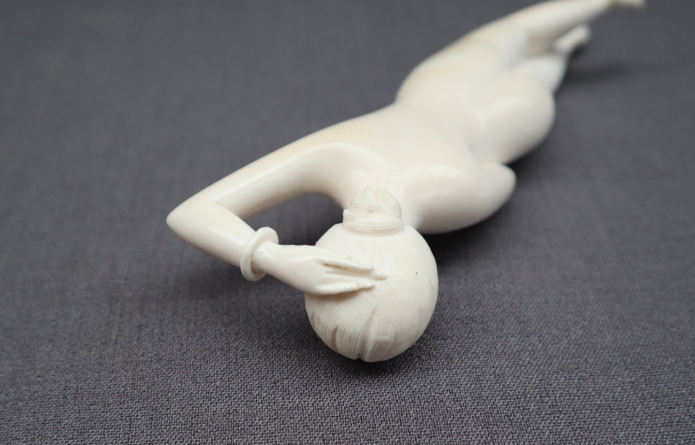 An early 20th century Japanese ivory erotica figure of a recumbent naked figure, 15. - Image 6 of 7