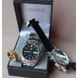 A Gentleman's Seiko 5 automatic wristwatch, with a black dial,