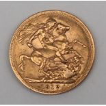 A George V gold sovereign,
