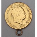 A George III gold sovereign dated 1817 with a ring mount, 7.