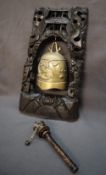 A Chinese bronze bell / gong, cast with a stylised dragon,