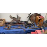 A dragon weather vane together with a collection of walking sticks, microscope, electroplated wares,