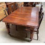 A Victorian mahogany extending dining table, with rounded corner,