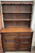 A 20th century oak dresser, the rack with two shelves,
