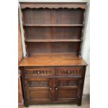 A 20th century oak dresser, the rack with two shelves,