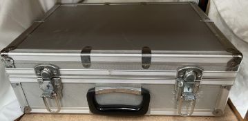 An Osawa camera suitcase with accessories