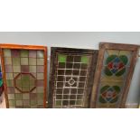 Three leaded and coloured glass panels