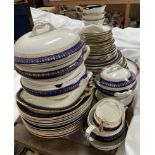 A wedgwood blue and white, gilt decorated part dinner set,