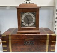 A Victorian walnut writing slope together with a walnut mantle clock