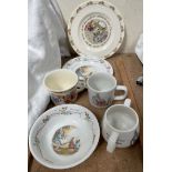 Assorted Royal Doulton and Wedgwood Bunnykins sets, including mugs,