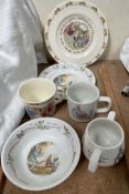 Assorted Royal Doulton and Wedgwood Bunnykins sets, including mugs,