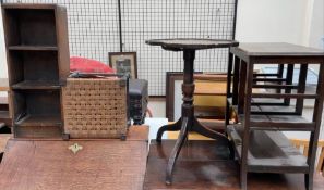 A 19th century walnut tripod table together with two oak bookcases and a stool