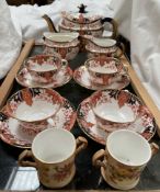 A Royal Crown Derby part tea set, comprising a teapot, cream jug,