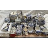A blue and white willow pattern part dinner service together with other blue and white pottery,