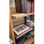 A Holy Bible together with a collection of books, stamps, horse racing print, blue and white dishes,