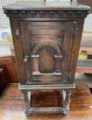 A 20th century oak bedside cabinet,