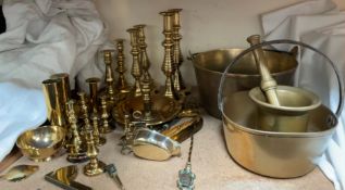 Two bronze preserving pans, together with a pestle and mortar,