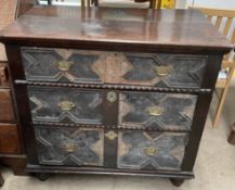 An 18th century oak chest,