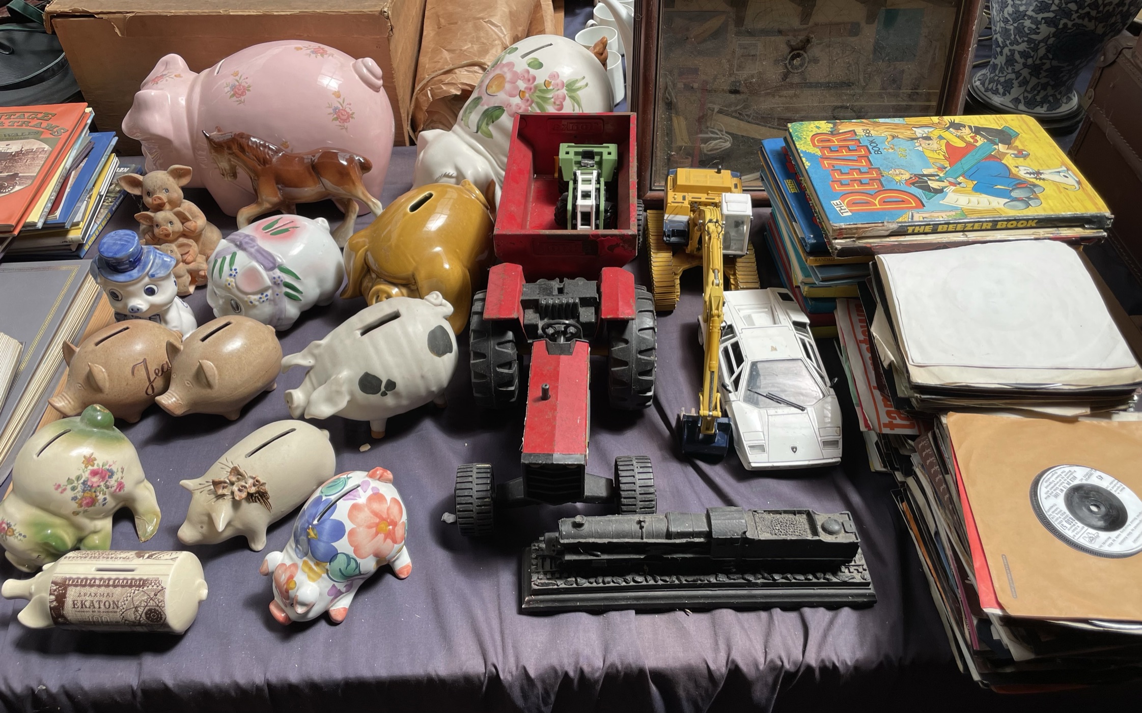 A Tonka toys tractor and trailer together with other toys, children's annuals, ship diorama,