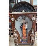 A table top altar piece with shell carved frieze and glazed door,