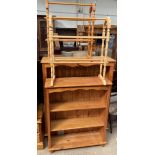 Two pine bookcases together with two towel rails