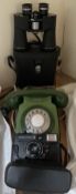 A green bakelite telephone,