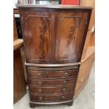 A 20th century mahogany drinks cabinet,