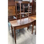 A 20th century oak side table with a D shaped top on square legs and spade feet,