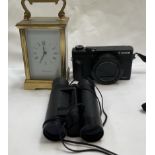 A Mappin and Webb brass cased carriage clock together with a Canon G5X camera and folding