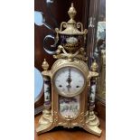 A 20th century gilt metal and printed porcelain panel mantle clock,