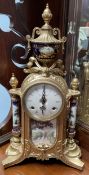 A 20th century gilt metal and printed porcelain panel mantle clock,