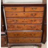 A 19th century oak chest on chest, with a moulded cornice above two short and three long drawers,